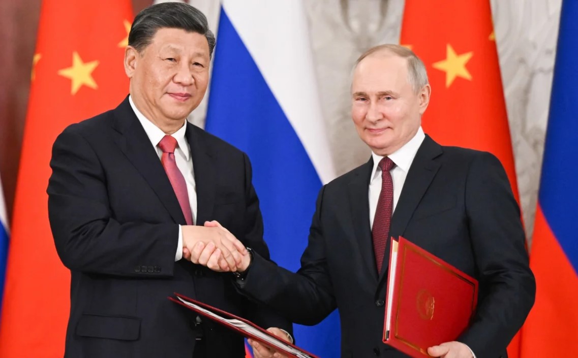 Xi Jinping pledges to work to 'rejuvenate' China-Russia ties