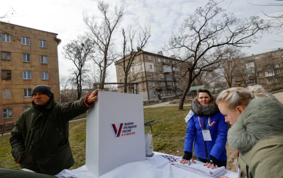 At gunpoint, Ukrainians in occupied regions vote in Russia’s election