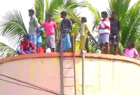 Villagers climb atop water tank to protest against airport expansion in Tamil Nadu